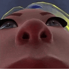 a close up of a cartoon character 's nose and eyes looking up at the camera .