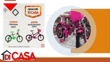 a pink bicycle is on display next to a poster that says di casa