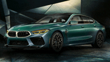 a green bmw is parked in a dark garage