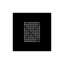 a black square with white dots on it is on a black background .