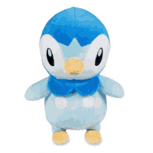 a blue stuffed animal with a yellow beak