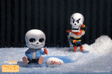 a sans and papyrus figurine are sitting in the snow