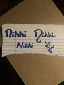 a piece of paper that has the name nikki written on it