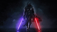 a man in a hood is holding two lightsabers in his hands .