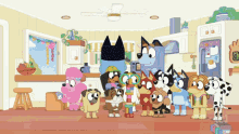 a group of cartoon characters standing in a kitchen