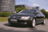 a black volkswagen with a license plate that says ho8 dd 103
