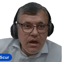 a man wearing glasses and headphones has a blue sticker that says scur