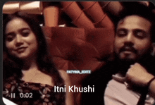 a man and a woman are standing next to each other with the words itni khushi below them