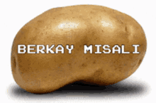 a potato that has the words berkay misali on it