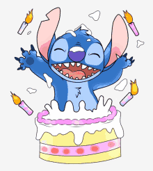 stitch is jumping out of a birthday cake with candles around him