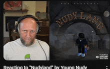 a man wearing headphones next to a picture of nudy land