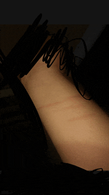 a close up of a person 's arm with a few lines visible