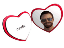 a heart shaped mirror with the word mortar on the front