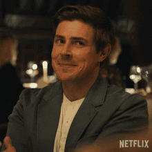 a man is smiling in a netflix advertisement