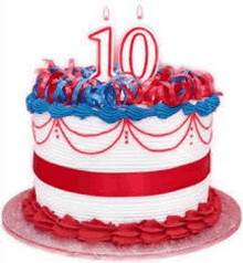 a birthday cake with red , white and blue frosting and candles on top .