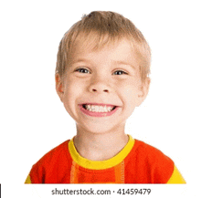 a young boy wearing a red and yellow shirt is smiling