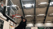 a basketball court with a sign that says grizzlies