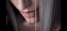 a close up of a woman 's face with the words " sephiroth the reunion " visible