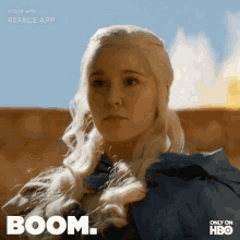 a woman with blonde hair and the word boom on the bottom right