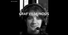 a black and white photo of a man wearing headphones with the words graf villainous in loving memory