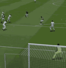 a soccer game is being played with a goalie in yellow