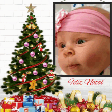 a picture of a baby in front of a christmas tree with feliz natal written in red