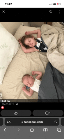 a picture of two children sleeping on a bed is on facebook