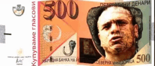 a 500 denari banknote with a man 's face on it