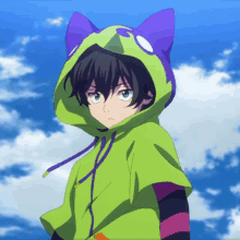 a person wearing a green hoodie with a purple cat ear