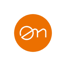 an orange circle with the letter n inside