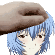 a hand is putting a cookie on the head of a girl with blue hair .