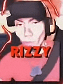 a close up of a person wearing headphones and a hat with the word rizzy on it .