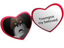 a heart shaped mirror with the words towngos my beloved written on it