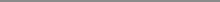 a close up of a plain gray background