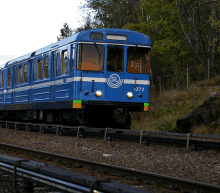 a blue train with the numbers 1372 on the front