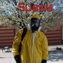 a man wearing a gas mask and a yellow jacket with the word sussy on the bottom