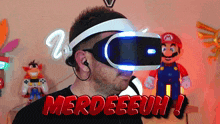 a man wearing a virtual reality headset with the words merdeeeuh on the bottom