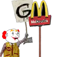 a clown is holding a sign that says gm in front of a mcdonalds sign