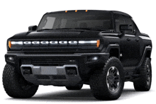 a black hummer truck with the letter h on the front bumper