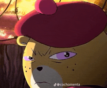 a cartoon of a bear wearing a pink beret with the hashtag cochomenta at the bottom