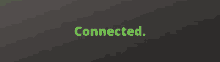 a sign that says connected in green on a dark background