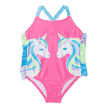 a pink swimsuit has two unicorns on it