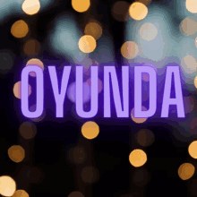 a purple and white sign that says oyunda on it