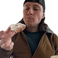 a man eating a pastry with powdered sugar while wearing a jacket that says merrell