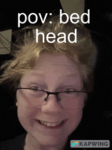 a boy wearing glasses is smiling with the words pov bed head above him