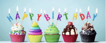 a row of cupcakes with birthday candles that say happy birthday