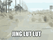 a picture of a road with the words jing lut lut