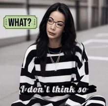 a woman wearing glasses and a black and white striped shirt with the words what i don t think so below her