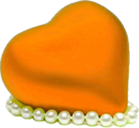 a yellow heart is surrounded by pearls on a white background