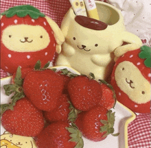 strawberries on a plate with pompompurin stuffed animals